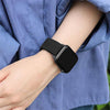 a girl wearing black comfit apple watch band