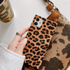 A girl holding Brown Cheetah Spots - iPhone Square Case