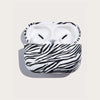 white color with black zebra stripe, matte textured, apple airpods pro first gen/second gen case showcased open lead